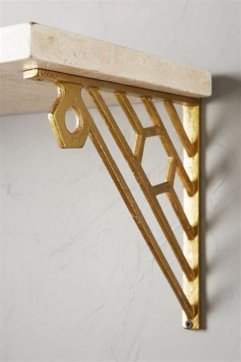 black and gold metal brackets for open face shelving|gold self tapping supports.